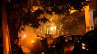 Greece Police thugs start a riot attacking people with glass bottles flares amp flashbang grenades [upl. by Trin]