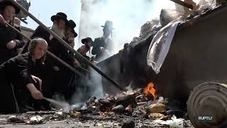 UltraOrthodox Jews burn leavened bread in Jerusalem ahead of Passover [upl. by Nylsirhc117]