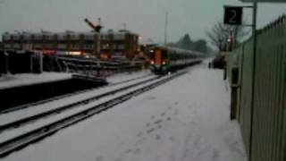 A 4car 377 Just manages to get away from a snowy Polegate [upl. by Ilenay]