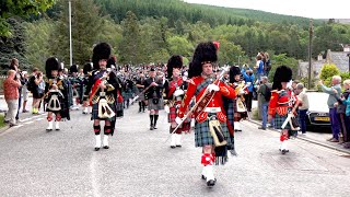 Massed pipes amp drums parade through town to the 2019 Ballater Highland Games in Scotland [upl. by Amapuna]