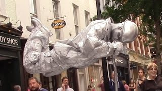 Silver man secret revealed London street performer floating and levitating trick [upl. by Lewison]