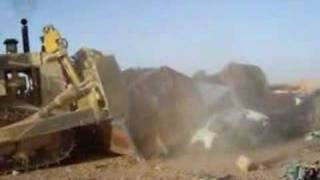 Armored D9 Dozer crushing cars in Iraq [upl. by Boleslaw]