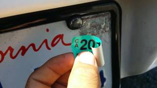 how to licence plate renewal sticker install [upl. by Nednerb60]