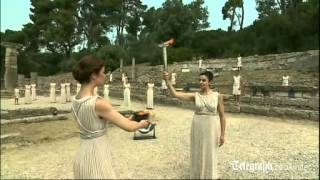 London 2012 Olympic torch lit from sun in Olympia [upl. by Doy]