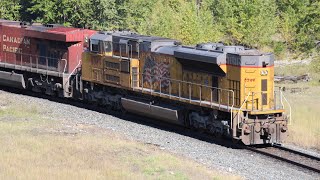 RARE and Strange CP small gondola train with UP SD70ACE Thundercab facing Backwards at Sparwood [upl. by Anidene854]