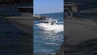 Whaler  32 Foot Outrigger Makes A Manasquan Inlet Pass [upl. by Gninnahc]