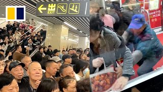 Spicy chicken giveaway turns into chaos on China metro [upl. by Nara]