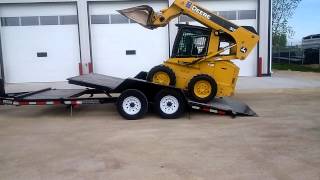 Loading a felling ft 14 tilt skid steer trailer at Querel Trailers [upl. by Coray265]