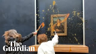 Moment protesters throw soup at Mona Lisa painting in Paris [upl. by Siari]