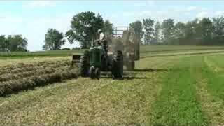 Baling hay with a John Deere 630 tractor and 336 baler [upl. by Ahsenot685]