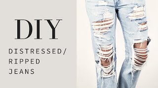 HOW TO  DIY Distressed  Ripped Jeans Tutorial [upl. by Renae]