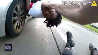 Bodycam Getaway Driver Drags Cop After Teen Suspect Hops in Back Seat During Foot Chase [upl. by Sualokin]