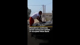 Palestinian confronts Israeli armoured vehicle in occupied West Bank  AJ shorts [upl. by Mayberry]