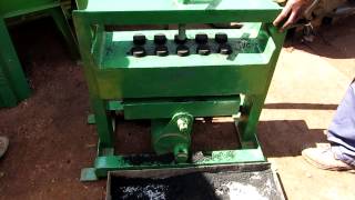 Manual charcoal briquette maker  10 at a time with a lever [upl. by Vergil]