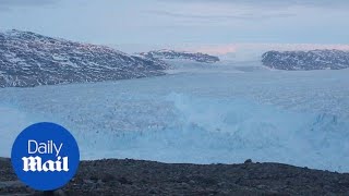 Monstrous iceberg seen breaking off Greenland glacier [upl. by Soelch]