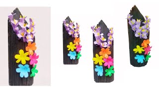 how to make flower vase wall hanging  flower vase out of news paper  wall decoration ideas [upl. by Ardnoel576]