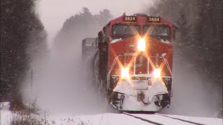 Kicking Up Snow  Awesome Approach View Freight Train CN 594 West near Boundary Creek NB [upl. by Aneryc]