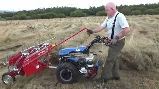 Using the new hay making equipment [upl. by Ehcor]