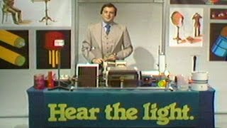 Bell Labs Henry Feinberg Demonstrates Ways of Using Light to Transmit Sound Waves 1978 [upl. by Llenrep]