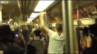 Two Total Strangers Have Saxophone Battle On NYC Subway Train [upl. by Enriqueta]