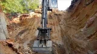 Excavator Digging A Borrow Pit [upl. by Moe]