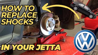 How To Replace Rear Shocks MK4 VW Jetta or Golf [upl. by Alisander107]