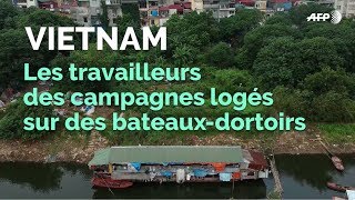 VIETNAM les bateauxdortoirs refuges des travailleurs pauvres  AFP Photo [upl. by Enimaj]