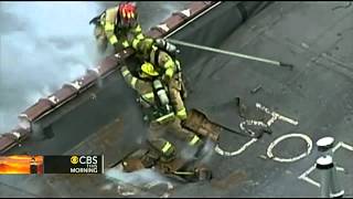 Roof collapse close call for firefighters [upl. by Eastlake]