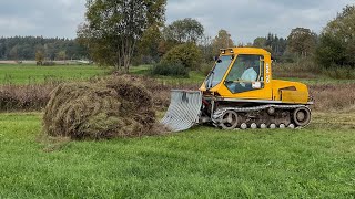 Landschaftspflege im Moor mit einer Multifunktionsraupe mit Schild zum Räumen [upl. by Mosira]