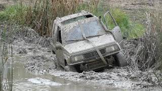 Small GEO Tracker vs Big Bounty Mud Hole Mudding [upl. by Melinde]