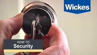 How to fit a British Rim Cylinder Lock with Wickes [upl. by Mikihisa116]