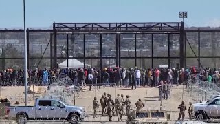 Migrants rush the Texas border in El Paso [upl. by Nelyk]