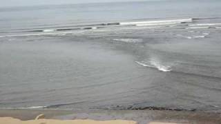 Ocean drawback  receding at Playa Barranco Lima Peru following 88 magnitude Chile earthquake [upl. by Ayadahs852]