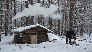 Winter shelter building in the woods Solo bushcraft Off grid log cabin [upl. by Frank]