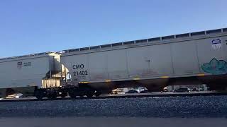 Inbound grain train passes Ellsworth Rd with a DPU [upl. by Rehpotisrhc]