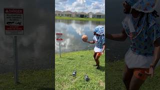 Grown Baby kicks basketball in alligator Lake 😳😂 shorts [upl. by Jaquenette223]