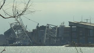 Images of collapsed Baltimore bridge as demolition crews work on it after ship collision  AFP [upl. by Acinomal738]