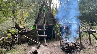 Building Complete And Warm Bushcraft Survival Shelter On A Fallen Trunk Waterproof Hut Fireplace [upl. by Aerahs]