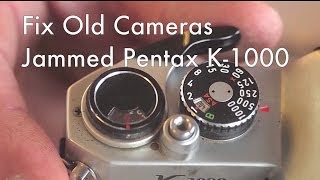 Fix Old Cameras Pentax K1000 Jammed Film Transport [upl. by Ahseinar]