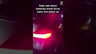 Body camera footage shows the moment a drunk driver crashed into a parked police car police crash [upl. by Mayhew]