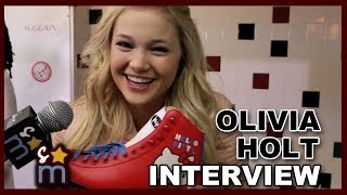 Olivia Holt Talks quotI Didnt Do Itquot amp Shows Off Roller Skates [upl. by Fabi975]